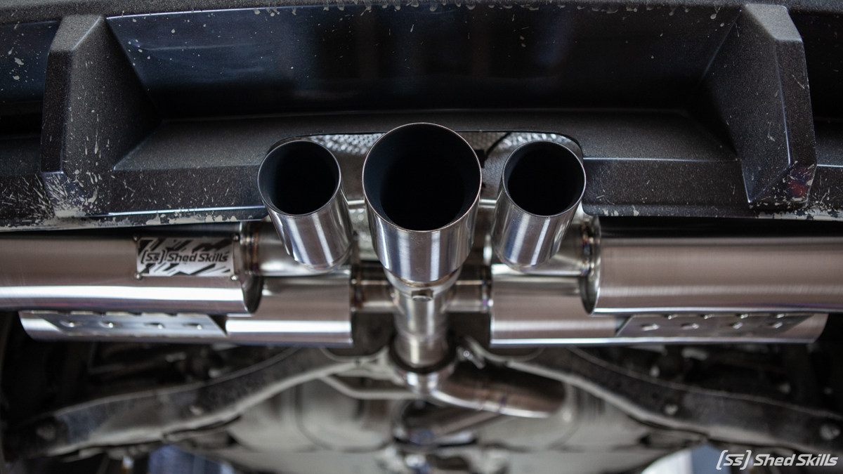 Выхлопная система по середине